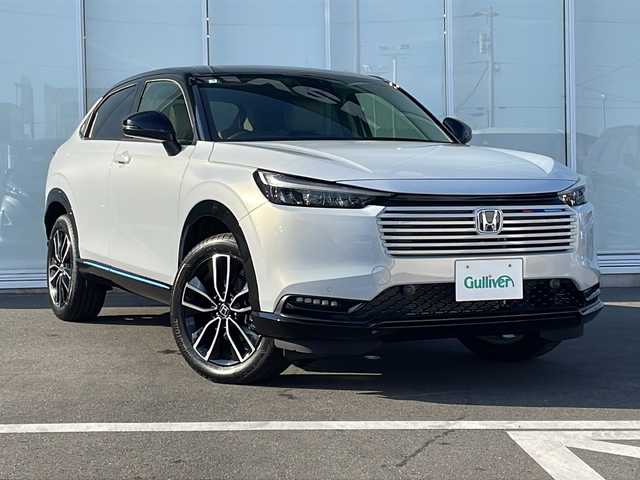 ホンダ ヴェゼル ハイブリッド e:HEV Z PLaYパッケージ 神奈川県 2025(令7)年 0.1千km 白Ⅱ 実走行距離35km/純正9インチメモリナビ/AppleCarPlay/AndroidAuto/フルセグ/FM/AM/ハンズフリーパワーバックドア/ワイヤレス充電/バックカメラ/ブラインドスポットモニター/レーンキープアシスト/クルーズコントロール/ハーフレザーシート/パドルシフト/LEDヘッドライト/フロントシートヒーター/AUTOライト/ビルトインETC2.0/スマートキー/プッシュスタート