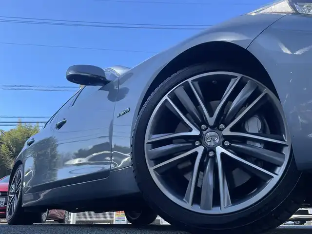 日産 スカイライン ハイブリッド 350GT Type SP 熊本県 2016(平28)年 6.2万km ハガネブルーM 純正ナビ/【フルセグTV/Bluetooth/CD/DVD】/アラウンドビューモニター/バックカメラ/レーダークルーズコントロール/純正19インチAW/黒レザーシート/パワーシート/シートヒーター/ステアリングスイッチ/パーキングセンサー/横滑り防止機能/革巻きステアリング/パドルシフト/ビルトインETC/前後ドライブレコーダー/純正フロアマット/プッシュスタート/スマートキー