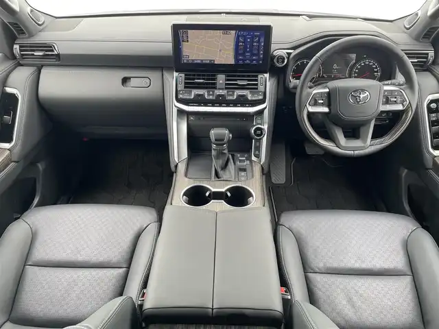 トヨタ ランドクルーザー ZX 福岡県 2024(令6)年 0.3万km プレシャスホワイトパール ワンオーナー/モデリスタエアロ/ムーンルーフ/JBLプレミアムサウンドシステム/12.3インチディスプレイオーディオPlus/フルセグTV/CD/DVD/BT/SD/AM/FM/applecarplay/androidauto/Miracast/パノラミックビューモニター/トヨタセーフティセンス/PCS/LTA/RSA/PKSB/レーダークルーズコントロール/LEDヘッドランプ/オートマチックハイビーム/BSM/クリアランスソナー/指紋認証スタートスイッチ/ハンズフリーパワーバックドア/D/Nパワーシート/快適温熱シート＆シートベンチレーション/ステアリングヒーター/電動パーキングブレーキ/ブレーキホールド/純正20インチAW/ビルトインETC2.0/アクセサリーコンセント