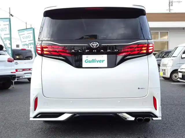 トヨタ アルファードハイブリット Z 千葉県 2024(令6)年 0.9万km パール ワンオーナー/純正14インチナビ/パノラマビューモニター/ビルトインETC2.0/モデリスタエアロパーツセット（F/S/R）/モデリスタドレスアップマフラー/左右独立ムーンルーフ/デジタルインナーミラー /トヨタチームメイトアドバンストパーク/カラーヘッドアップディスプレイ/前後ドライブレコーダー/スマートキー2本/プッシュスタート/ユニバーサルステップ/両側パワースライドドア /パワーバックドア /TVキャンセラー/保証書