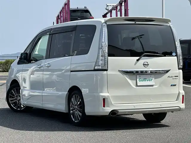 日産 セレナ ライダー パフォーマンス S HV 島根県 2014(平26)年 7.3万km ブリリアントホワイトパール エマージェンシーブレーキ/純正9インチナビ/CD/DVD/DTV/Bluetooth/アラウンドビューモニター/両側パワースライドドア /クルーズコントロール/ガラスルーフ/コーナーセンサー /LEDオートライト/スマートキー/プッシュスタート /純正フロアマット/純正ドアバイザー/アイドリングストップ/電動格納ミラー/横滑り防止装置/車椅子収納装置付き/レーンキープ