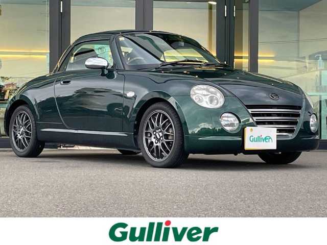 ダイハツ コペン ULTIMATE ED S 東京都 2012(平24)年 4.2万km ダークグリーンマイカ ケンウッドSDナビ/CD/DVD/AM/FM/Bluetooth/フルセグTV/前後方ドライブレコーダー/レザーシート/シートヒーター/HIDヘッドライト/フォグランプ/MOMOステアリング/BBS15インチAW