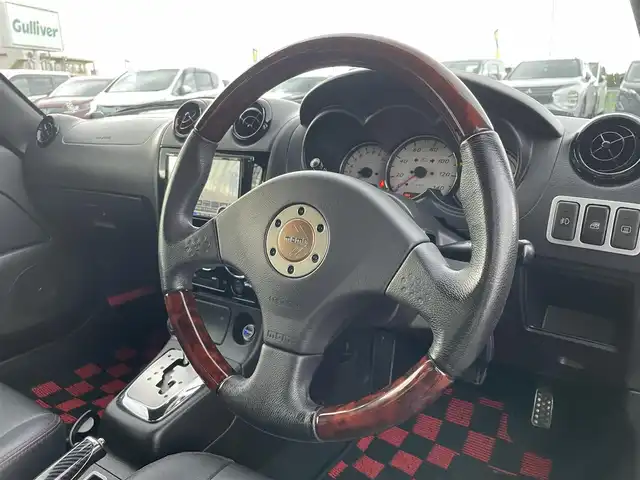 ダイハツ コペン ULTIMATE ED S 東京都 2012(平24)年 4.2万km ダークグリーンマイカ ケンウッドSDナビ/CD/DVD/AM/FM/Bluetooth/フルセグTV/前後方ドライブレコーダー/レザーシート/シートヒーター/HIDヘッドライト/フォグランプ/MOMOステアリング/BBS15インチAW