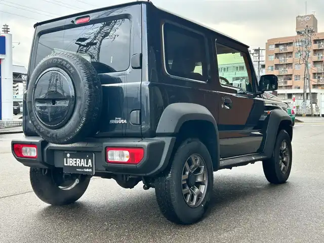 スズキ ジムニー シエラ JC 富山県 2024(令6)年 1.3万km 黒 社外ナビ/フルセグテレビ/Bluetooth接続/USB接続/AM/FMラジオ/DVD/CD再生/アイドリングストップ/プッシュスタート/クルーズコントロール/４WD/シートシートヒーター/オートエアコン/横滑り防止/衝突軽減/車線逸脱防止