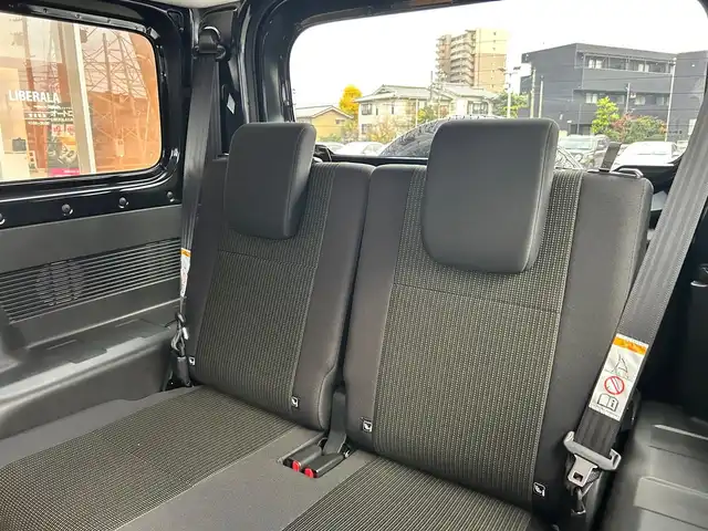 スズキ ジムニー シエラ JC 富山県 2024(令6)年 1.3万km 黒 社外ナビ/フルセグテレビ/Bluetooth接続/USB接続/AM/FMラジオ/DVD/CD再生/アイドリングストップ/プッシュスタート/クルーズコントロール/４WD/シートシートヒーター/オートエアコン/横滑り防止/衝突軽減/車線逸脱防止