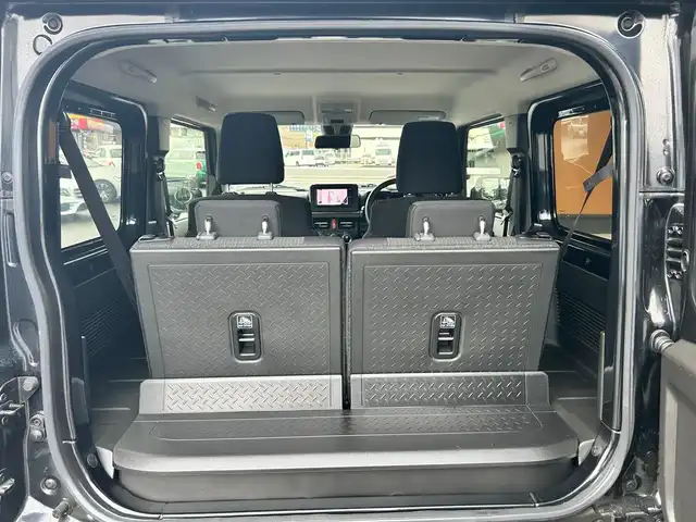 スズキ ジムニー シエラ JC 富山県 2024(令6)年 1.3万km 黒 社外ナビ/フルセグテレビ/Bluetooth接続/USB接続/AM/FMラジオ/DVD/CD再生/アイドリングストップ/プッシュスタート/クルーズコントロール/４WD/シートシートヒーター/オートエアコン/横滑り防止/衝突軽減/車線逸脱防止