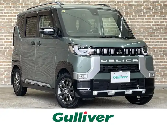 三菱 デリカミニ G プレミアム 岩手県 2023(令5)年 0.5万km アメジストブラック 4WD/ルーフレール/社外ディスプレイオーディオ/バックカメラ/アラウンドビューモニター/ETC2.0/アダプティブクルーズコントロール/両側パワースライドドア/前席シートヒーター/ステアリングヒーター/純正15インチアルミホイール/コーナーセンサー/取扱説明書/保証書/スペアキー1本