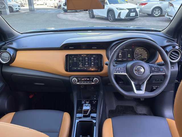 日産 キックス X FOUR ツートーンインテリアED 秋田県 2024(令6)年 3.5万km ダークブルー ワンオーナー/セーフティーアシスト/・プロパイロット/・エマージェンシーブレーキ/・インテリジェントルームミラー/・前方衝突予測警報/・ふらつき警報/・ハイビームアシスト/・車線逸脱防止支援システム/・インテリジェント アラウンドビューモニター/・踏み間違い衝突防止アシスト/純正メモリーナビ/　CD/DVD/SD/USB/　フルセグTV/Bluetooth/ビルトインETC/シートヒーター/２トーンレザーシート/冬タイヤAW付あり/LEDヘッドライト/純正フロアマット/ドアバイザー