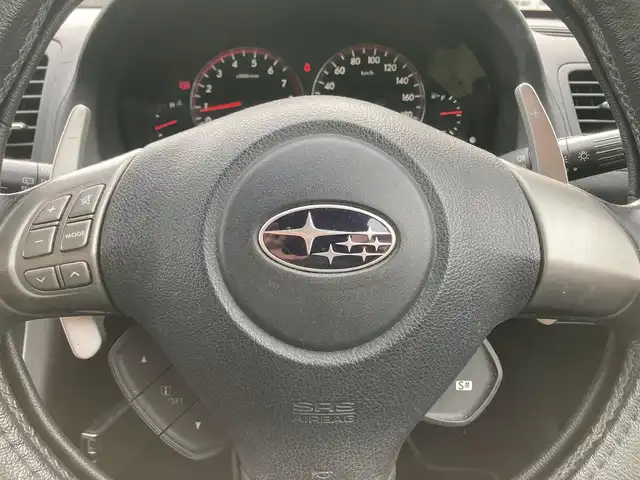 スバル レガシィ ツーリングワゴン 2．0GT 千葉県 2006(平18)年 9.3万km ダイヤモンドグレーメタリック 社外ナビ/（フルセグ/BT/DVD/SD）/バックカメラ/ETC/前後ドライブレコーダー/STI　Genomeマフラー/HIDヘッドライト/ルーフレール/パドルシフト/モモステ/キーレスリモコン/トノカバー/純正フロアマット