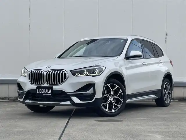 ＢＭＷ Ｘ１ xDrive 18d xライン EDジョイ+ 東京都 2020(令2)年 2.7万km 白 純正HDDナビ/ドライビングアシスト/ワンオーナー/スマートキー/プッシュスタート/4WD/MFSW/アダプティブクルーズコントロール/オートライト/フォグライト/純正ナビ/Bluetooth接続/ハーフレザーシート/電動パワーシート/バックモニター/パークアシスト/コーナーセンサー/ETC/純正LEDヘッドライト/純正18インチアルミホイール/電動パワーゲート