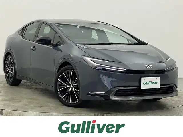トヨタ プリウス Z 宮城県 2023(令5)年 2.3万km グレーＭ パノラマルーフ　/デジタルインナーミラー　/純正１２型コネクティッドナビ　/パノラミックビューモニター　/アダプティブクルーズコントロール/プリクラッシュセーフティ/レーントレーシングアシスト/オートマチックハイビーム/LEDヘッドランプ/アドバンスドパーク　/クリアランスソナー/ＢＳＭ　/ＲＣＴＡ　/ワイヤレス充電　/リアフォグランプ　/パワーバックドア　/ＥＴＣ２．０/シートヒーター/ベンチレーション/禁煙車/スペアタイヤ