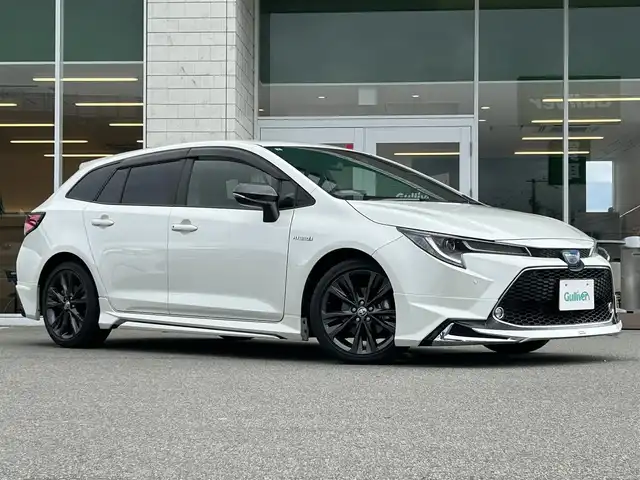 トヨタ カローラツーリング ハイブリッド ダブルバイビー 兵庫県 2020(令2)年 6.2万km ホワイトパールクリスタルシャイン 純正9インチディスプレイオーディオ/フルセグテレビ/BTオーディオ/バックカメラ/ハーフレザーシート/モデリスタエアロ/前席シートヒーター/ステアリングヒーター/ETC/純正17インチAW/LEDヘッドライト/オートハイビーム