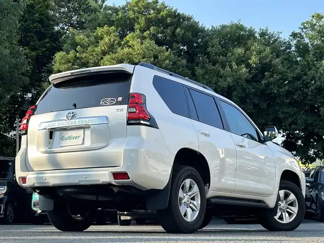 トヨタ ランドクルーザー プラド TX 東京都 2021(令3)年 2.6万km ホワイトパールクリスタルシャイン ワンオーナー/SDナビ（MDV-M907HDL）/・Bluetoothオーディオ/USBオーディオ/・フルセグTV/HDMI/DVD/電動ムーンルーフ/ブラックルーフレール/Toyota Safety Sense/・プリクラッシュセーフティ/・レーンディパーチャーアラート/・オートマチックハイビーム/・レーダークルーズコントロール/ETC/前後ドライブレコーダー/・ZDR 035/取扱説明書/保証書/スペアキー1本