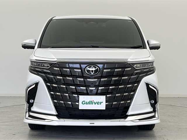 トヨタ アルファードハイブリット Z 宮城県 2024(令6)年 0.6万km プラチナホワイトパールマイカ ワンオーナー/禁煙車/モデリスタエアロ（F.S.R）/左右独立ムーンルーフ/純正13.2インチ有機EL後席モニター/パノラミックビューモニター/トヨタセーフティセンス/・プリクラッシュセーフティ/・レーントレーシングアシスト/・レーダークルーズコントロール/・ブラインドスポットモニター/・リアクロストラフィックアラート/・クリアランスソナー/純正14インチディスプレイナビ/・USB.BT.Miracast/フルセグTV/デジタルインナーミラー/AC1500W充電/両側パワースライドドア/電動リアゲート/レザーシート/・パワーシート（1/2列目）/・シートヒーター（1/2列目）/・エアシート（1/2列目）/ウッドコンビステアリングホイール/ステアリングヒーター/ビルトインETC2.0/社外ドライブレコーダー（FR）/LEDヘッドライト/LEDフォグランプ/プッシュスタート/スマートキー2個/純正18インチアルミホイール/純正フロアマット