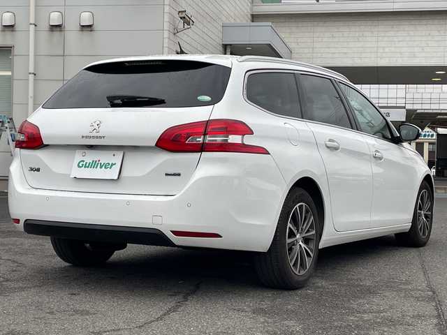 プジョー ３０８ SW アリュール ブルーHDi 広島県 2017(平29)年 3.1万km ビアンカホワイト スカイルーフ/純正ディスプレイオーディオ【AM/FM/CD】/バックカメラ/ETC/ドライブレコーダー/横滑り防止装置/クルーズコントロール/パドルシフト/前後コーナーセンサー/LEDヘッドライト/オートワイパー/オートライト/フォグランプ/純正フロアマット/プッシュスタート/スマートキー/スペアキー