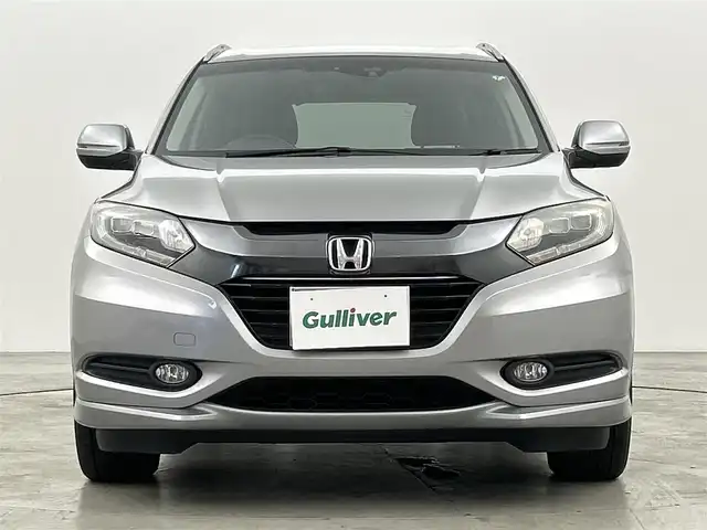 ホンダ ヴェゼル ハイブリッド Z 福岡県 2015(平27)年 8.5万km ティンテッドシルバーM メーカーオプションナビ　/バックカメラ　/ビルトインＥＴＣ　/クルーズコントロール　/シティブレーキアクティブシステム　/パドルシフト　/ハーフレザーシート　/シートヒーター　/純正１７インチＡＷ　/ＬＥＤヘッドライト