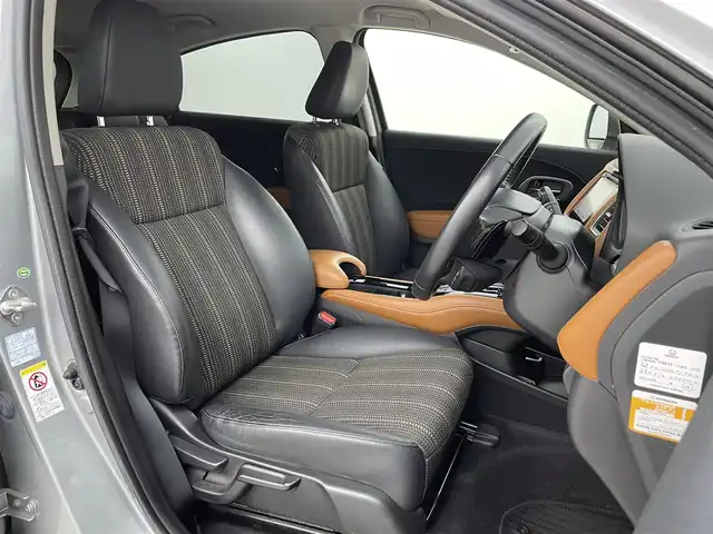ホンダ ヴェゼル ハイブリッド Z 福岡県 2015(平27)年 8.5万km ティンテッドシルバーM メーカーオプションナビ　/バックカメラ　/ビルトインＥＴＣ　/クルーズコントロール　/シティブレーキアクティブシステム　/パドルシフト　/ハーフレザーシート　/シートヒーター　/純正１７インチＡＷ　/ＬＥＤヘッドライト