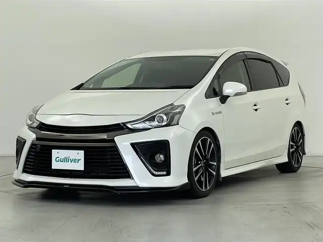 トヨタ プリウス α S ツーリングセレクション G’s 群馬県 2016(平28)年 7万km ホワイトパールクリスタルシャイン 寒冷地仕様/・ウィンドシールデアイサー/・ヒーター付ドアミラー/・リヤフォグランプ/＝＝＝＝＝/ALPINE10インチフリップダウンモニター/Strada7インチナビ/・AM/FM/CD/DVD/SD/Bluetooth/フルセグTV/バックカメラ/SilkBLazeエアロ/ROWENマフラー/ESPELIRダウンサスペンション/純正ビルトインETC/プッシュスタート/スマートキー/ハーフレザーシート