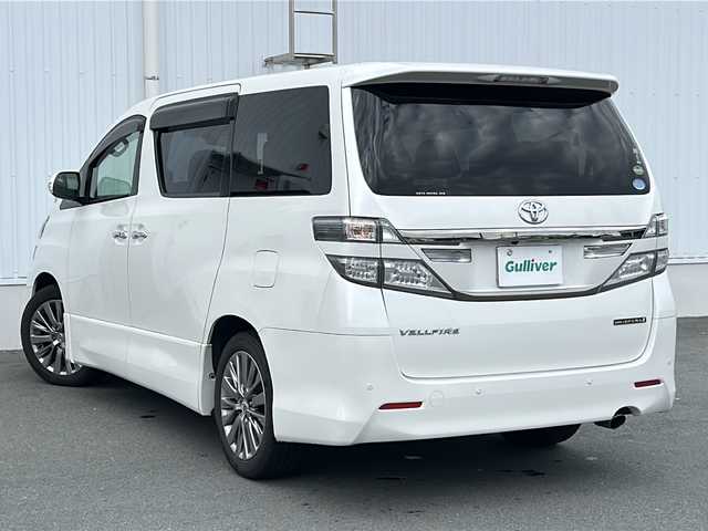 トヨタ ヴェルファイア 2．4Z ゴールデンアイズⅡ 三重県 2014(平26)年 7.3万km ホワイトパールクリスタルシャイン ALPINE10型ナビ /ALPINE10型後席モニター /バックカメラ /ETC /前後コーナーセンサー /AC100V充電 /両側パワースライドドア/スペアキー /オットマン /クルーズコントロール /純正フロアマット/ウッドコンビステアリング/ステアリングスイッチ/ハーフレザーシート /電動格納ミラー/禁煙車