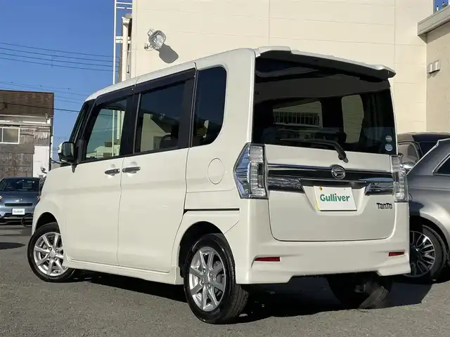ダイハツ タント カスタム X 和歌山県 2015(平27)年 8.8万km パールホワイトⅢ 社外ナビ/（FM/AM/ワンセグTV）/ワンオーナー/左パワースライドドア/ETC/AAC/オートミラー/横滑り防止装置/後席サンシェード/オートライト/保証書/取扱説明書