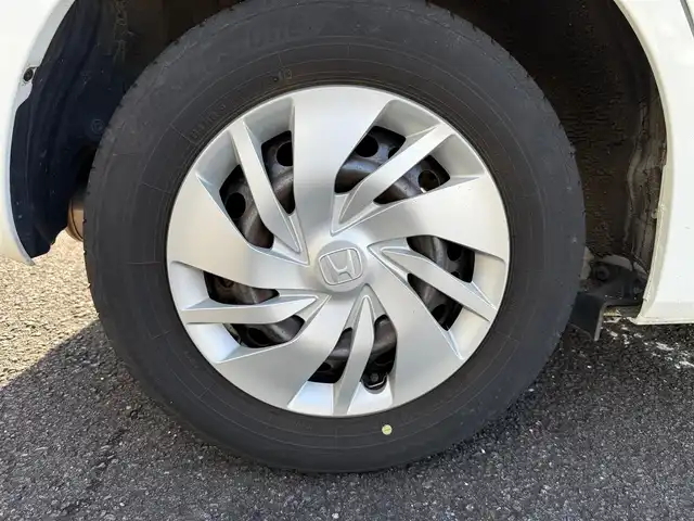 ホンダ フィット 13G Fパッケージ 静岡県 2015(平27)年 6万km タフタホワイト ワンオーナー/　・新車時保証書有り/走行距離：59/302Km(登録時)/車検：令和8年9月6日　迄/アイドリングストップ/純正ディスプレイオーディオ/バックカメラ/スマートキー×2/プッシュスタート/ウインカードアミラー/純正ドアバイザー/純正フロアマット/Wエアバック＋ABS/取説有り