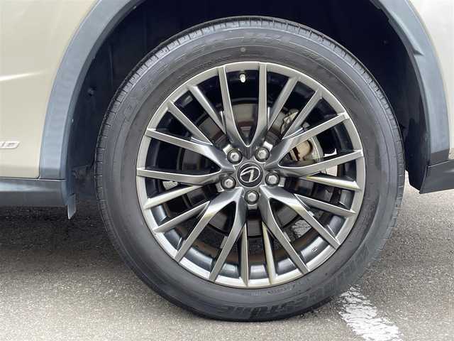 レクサス ＲＸ 450h Fスポーツ 青森県 2016(平28)年 8.5万km ソニックチタニウム /4WD/純正SDナビ/【BD/DVD/BT/フルセグTV】/マークレビンソンサラウンドサウンドシステム/バックカメラ/サイドカメラ/クルーズコントロール(追従走行有り)/衝突被害軽減ブレーキ/レーンキープアシスト/ブラインドスポットモニター(後側方車両検知警報)/横滑り防止/HUD/革巻きステア/ノブ/パドルシフト/電動チルトステア/黒革シート/前席シートヒーター/エアシート/　/パワーシート(D席メモリ有り)/前後バンパーソナー/ETC2.0/ステアリングヒーター/ミラーヒーター/リバース連動機能付きドアミラー/オートワイパー/オートライト/純正3眼LEDライト/シーケンシャルウインカー/パワーバックドア/スマートキー/プッシュスタート/純正20インチアルミホイール /リア5面スモークフィルム/LEDフォグ/純正ドアバイザー/純正フロアマット/W/サイド/カーテン/ニーエアバッグ/スペアキー×1【カードキー】/新車時整備手帳（保証書）/取扱説明書/記録簿
