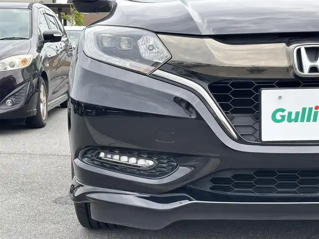 ホンダ ヴェゼル ハイブリッド RS ホンダセンシング 静岡県 2017(平29)年 4.4万km クリスタルブラックパール エンジンスタートボタン/パワーステアリング/パワーウィンドウ/アイドリングストップ/パドルシフト/スマートキー/オートエアコン/クルーズコントロール/バックカメラ/純正ナビ（CD/DVD/BT/フルセグ）/ドライブレコーダー前後/純正フロアマット/ハーフレザー/D席N席シートヒーター/純正アルミホイール/ABS/横滑り防止装置/レーンキープアシスト/オートライト/LEDヘッドライト/W＋サイドエアバック/衝突軽減システム/カーテンエアバック