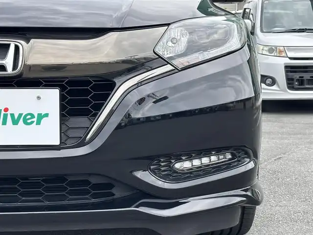 ホンダ ヴェゼル ハイブリッド RS ホンダセンシング 静岡県 2017(平29)年 4.4万km クリスタルブラックパール エンジンスタートボタン/パワーステアリング/パワーウィンドウ/アイドリングストップ/パドルシフト/スマートキー/オートエアコン/クルーズコントロール/バックカメラ/純正ナビ（CD/DVD/BT/フルセグ）/ドライブレコーダー前後/純正フロアマット/ハーフレザー/D席N席シートヒーター/純正アルミホイール/ABS/横滑り防止装置/レーンキープアシスト/オートライト/LEDヘッドライト/W＋サイドエアバック/衝突軽減システム/カーテンエアバック