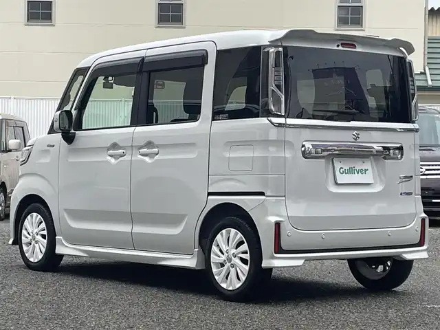 スズキ スペーシア カスタム HYBRID GS 大阪府 2023(令5)年 1.2万km ピュアホワイトP ワンオーナー/セーフティサポート（予防安全技術）/・デュアルカメラブレーキサポート/・誤発進抑制機能/・車線逸脱警報機能/・ふらつき警報機能/・先行車発進お知らせ機能/・ハイビームアシスト/・アダプティブクルーズコントロール/・後退時ブレーキサポート/・後方誤発進抑制/・リアパーキングアシスト/7型ディスプレイオーディオ（FH-8500DVS)/・Bluetooth接続/・AndroidAuto/・CD/DVD/前後ドライブレコーダー（ZDR-035)/片側パワースライドドア/LEDヘッドランプ/シートヒーター/横滑り防止機能/USB充電ポイント/純正エアロパーツ（サイド/リアスポイラー）/純正AW（14inch)/純正フロアマット/フォグランプ/ドアバイザー/ステアリングスイッチ/取扱説明書/保証書