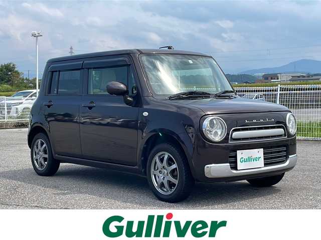 スズキ ラパン ショコラ G 富山県 2015(平27)年 3.9万km アーバンブラウンパールメタリック ４WD/純正CD/ETC/ポータブルナビ/シートヒーター /社外１４インチアルミ/純正フロアマット/ホイール付夏タイヤ積込/プッシュスタートエンジン/スマートキー/スペアキー