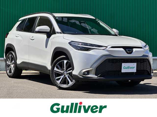 トヨタ カローラ クロス ハイブリッド Z 宮城県 2024(令6)年 0.8万km プラチナホワイトパールマイカ セーフティセンス/・プリクラッシュセーフティ/・レーントレーシングアシスト/・レーンディパーチャーアラート/・レーダークルーズコントロール/・オートマチックハイビーム/・ロードサインアシスト/・ドライバー異常時対応システム/・プロアクティブドライビングアシスト/・発進遅れ告知機能/パーキングサポートブレーキ（前後方静止物）/8インチディスプレイオーディオ/・Bluetooth/・フルセグTV/・AppleCarPlay/AndroidAuto/バックカメラ/ビルトインETC/ハンズフリーパワーバックドア/ハーフレザーシート/運転席パワーシート/シートヒーター/革巻きステアリング/ステアリングスイッチ/電動パーキングブレーキ/ブレーキホールド/LEDヘッドランプ/LEDシーケンシャルターンランプ/LEDデイタイムランニングランプ/フォグランプ/オートライト/スマートキー＆プッシュスタート/電動格納ミラー/純正18インチAW/フロアマット/W/サイド/カーテンエアバッグ