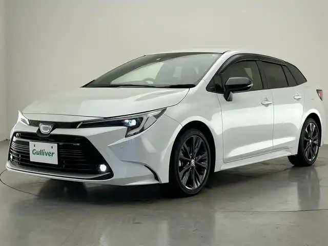 トヨタ カローラツーリング ハイブリッド ダブルバイビー 愛知県 2022(令4)年 3.2万km プラチナホワイトパールマイカ 純正１０．５型ナビ　バックカメラ　フルセグＴＶ　ミラキャスト　セーフティセンス　衝突軽減　追従クルコン　ＬＥＤオートライト　黒ハーフレザー　ＥＴＣ２．０　フォグ　プッシュスタート　コーナーセンサー　スマートキー　オートハイビーム　前後コーナーセンサー　電子パーキング　ブレーキホールド