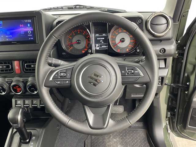 スズキ ジムニー シエラ JC 鹿児島県 2025(令7)年 0.4万km ジャングルグリーン ワンオーナー/社外ディスプレイオーディオ/バックカメラ/前後ドライブレコーダー/衝突軽減ブレーキ/車線逸脱警報/ヒルディセントコントロール/クルーズコントロール/ＥＴＣ/シートヒーター/スマートキー/純正フロアマット/保証書/取扱説明書