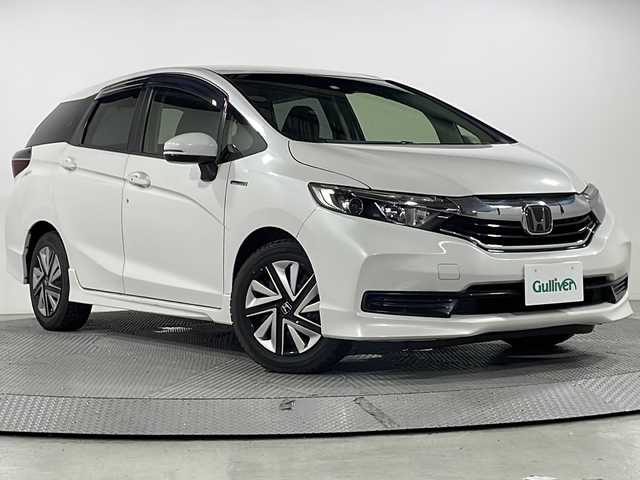 ホンダ シャトル ハイブリッド ホンダセンシング 広島県 2020(令2)年 5.5万km プラチナホワイトパール 社外ナビ/・フルセグTV/・Bluetooth/・CD/DVD/バックカメラ/ホンダセンシング/ETC/ステアリングスイッチ/ヘッドライトレベライザー/オートライト