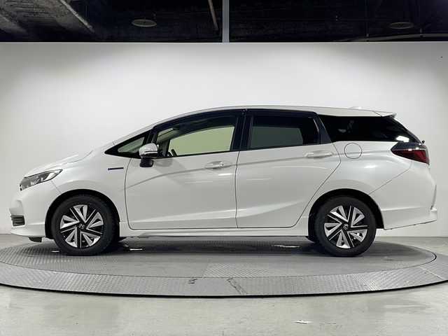 ホンダ シャトル ハイブリッド ホンダセンシング 広島県 2020(令2)年 5.5万km プラチナホワイトパール 社外ナビ/・フルセグTV/・Bluetooth/・CD/DVD/バックカメラ/ホンダセンシング/ETC/ステアリングスイッチ/ヘッドライトレベライザー/オートライト