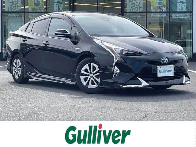 トヨタ プリウス A 岡山県 2016(平28)年 7.8万km アティチュードブラックマイカ 登録時走行距離77325km/ムーンルーフ/モデリスタフルエアロ/純正9インチナビ/フルセグTV(AM/FM/CD/DVD/Bluetooth)/バックカメラ/ビルトインETC/ヘッドアップディスプレイ/トヨタセーフティセンス/・ブラインドスポットモニター/・レーダークルーズコントロール/・アドバンストパーク/・プリクラッシュセーフティ/・オートマチックハイビーム/・レーントレーシングアシスト/純正フロアマット/15インチ純正AW/プッシュスタート/スマートキー×2