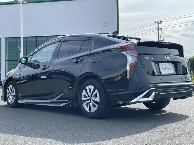 トヨタ プリウス A 岡山県 2016(平28)年 7.8万km アティチュードブラックマイカ 登録時走行距離77325km/ムーンルーフ/モデリスタフルエアロ/純正9インチナビ/フルセグTV(AM/FM/CD/DVD/Bluetooth)/バックカメラ/ビルトインETC/ヘッドアップディスプレイ/トヨタセーフティセンス/・ブラインドスポットモニター/・レーダークルーズコントロール/・アドバンストパーク/・プリクラッシュセーフティ/・オートマチックハイビーム/・レーントレーシングアシスト/純正フロアマット/15インチ純正AW/プッシュスタート/スマートキー×2