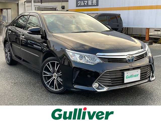 トヨタ カムリ ハイブリット レザーパッケージ 山口県 2014(平26)年 13.9万km アティチュードブラックマイカ 純正ナビ/DVD/BD/CD/SD/MSV/BT/USB/AUX/純正フルセグTV/バックカメラ/黒レザーシート/前席パワーシート/前席シートヒーター/純正HIDヘッドライト/純正フォグランプ/オートライト/社外18インチアルミホイール/革巻きステアリング/ステアリングスイッチ/クルーズコントロール/置くだけ充電/衝突被害軽減ブレーキ/横滑り防止/LKA/BSM/スマートキー/ビルトインETC/ドライブレコーダー/純正フロアマット/純正ドアバイザー/電動格納ウインカードアミラー