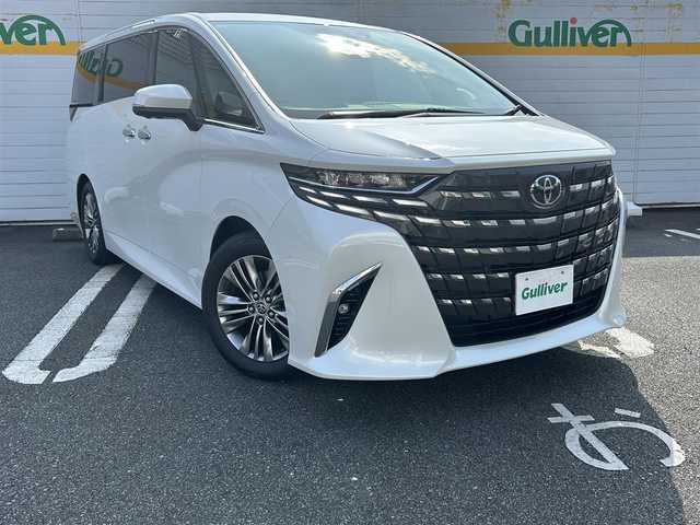 トヨタ アルファード Z 埼玉県 2024(令6)年 0.9万km プラチナホワイトパールマイカ 登録時走行距離8205km/純正DA（ナビ機能有）/フルセグテレビ/バックカメラ/オットマン/クルーズコントロール（ACC)/サンルーフ/プッシュスタート/両側パワースライドドア/パワーバックドア/ETC/ABS/全席パワーシート/全方位車外カメラ/Bluetooth接続/スマートキー/WAC/クリアランスソナー/パーキングサポートブレーキ/シートヒーター/エアシート