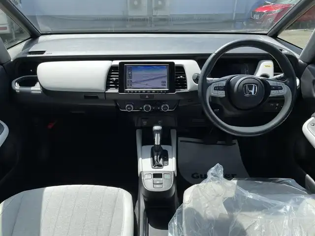 ホンダ フィット e:HEVホーム 石川県 2020(令2)年 5.1万km プラチナホワイトパール 純正8型ナビ/フルセグTV/バックカメラ/LEDヘッドライト/ETC/ホンダセンシング/レーダークルーズ/スマートキー/プッシュスタート/電動ミラー/コーナーセンサー/ABS/保証書