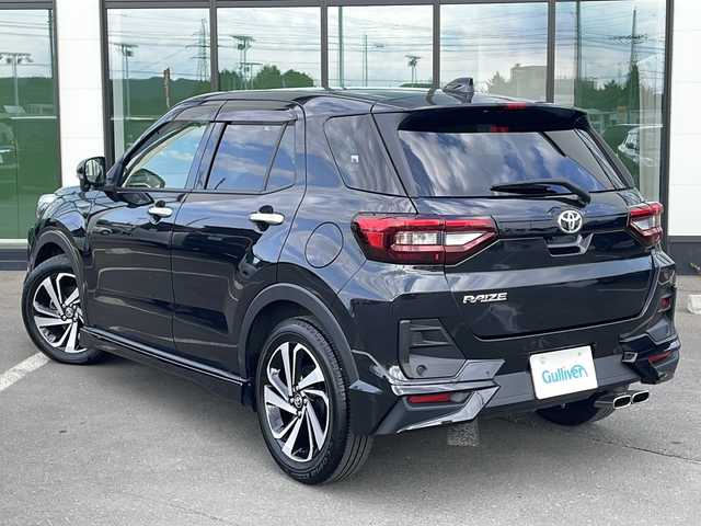 トヨタ ライズ Z 道東・釧路十勝 2023(令5)年 2万km ブラックマイカメタリック ・４WD/・寒冷地仕様/・純正９インチSDメモリナビ/（AM・FM・CD・DVD・BT・フルセグ)/・全方位カメラ/・レーダークルーズコントロール/・スマートキー/・プッシュスタート/・前席シートヒーター/・オートブレーキホールド/・ETC/・純正１７インチアルミホイール/・横滑り防止装置/・衝突被害軽減ブレーキ/・フォグライト/・前後コーナーセンサー/・アイドリングストップ/・置くだけ充電/・電動格納ミラー/・ドアバイザー/・モデリスタエアロ（フロント・サイド）/・社外マフラー