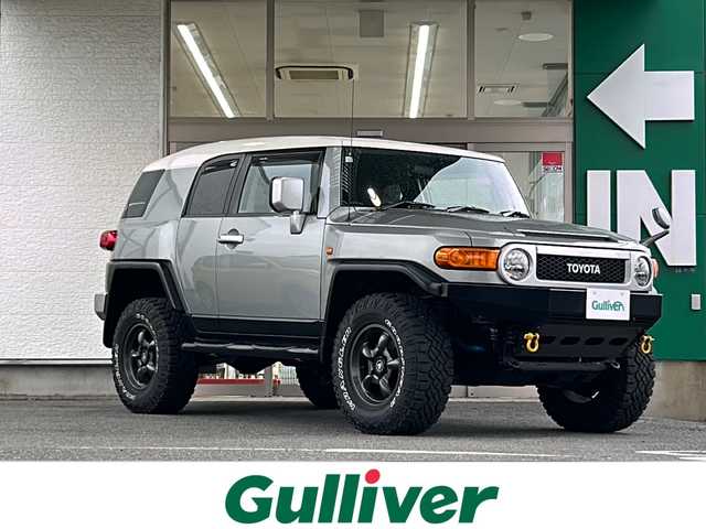 トヨタ ＦＪクルーザー 愛知県 2011(平23)年 6.1万km グレーメタリック/ホワイト 禁煙車/１オーナー/４WD/ヒッチメンバー/GANADORマフラー/RAGUNAホイール/Westinサイドステップ/社外ナビ/ワンセグ/バックカメラ/後方コーナーセンサー/クリアランスソナー/ステアリングリモコン/USB入力端子/フォグ/ドアバイザー/背面タイヤ/ETC/スペアキー/取説/保証書
