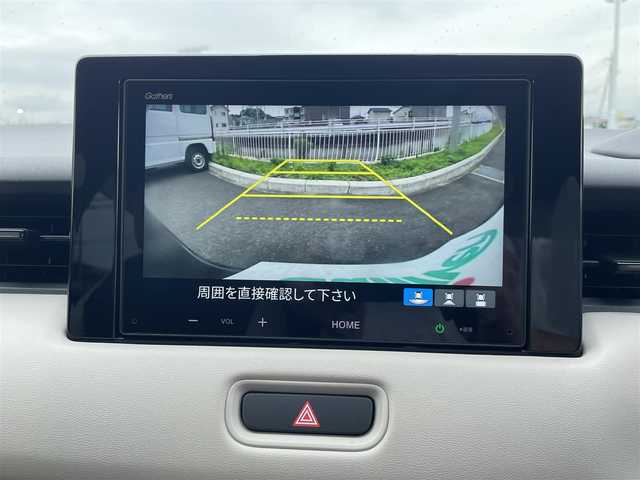 ホンダ ヴェゼル ハイブリッド e:HEV Z 群馬県 2024(令6)年 0.7万km クリスタルブラックパール 純正ディスプレイオーディオ（Gathers VX-240ZFE）/（FM/AM/Apple Car Play/ Android Auto/ iPod//Bluetooth）/Honda SENSING/・路外逸脱抑制機能/・ブラインドスポットインフォメーション/・踏み間違い衝突軽減システム/・衝突軽減ブレーキ/・標識認識機能表示/電子パーキングブレーキ/ヒルディセントコントロール/ブレーキホールド/ビルトインETC/ステアリングヒーター/フロントガラス熱線/フルオートパワーウインドウ/パドルシフト/ドアバイザー/パドルシフト/純正フロアマット/純正アルミ/取扱説明書