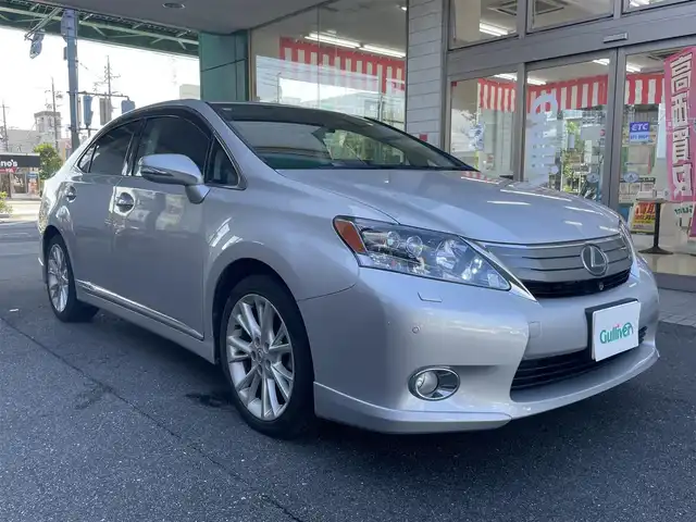 レクサス ＨＳ 250h バージョンS 愛知県 2010(平22)年 8.4万km シルバーマイカメタリック 純正エアロ〈フロント・リアアンダー／トランク〉/純正HDDナビ/DVD／AUX／地デジTV/フロント・バックカメラ/前席パワーシート/ミリ波レーダー式プリクラッシュセーフティ〈MOP〉/レーダークルーズコントロール〈MOP〉/クリアランスソナー〈MOP〉/LEDヘッドライト〈オートライト付〉/ヘッドライトクリーナー/純正18インチAW/スマートキー＆プッシュスタート