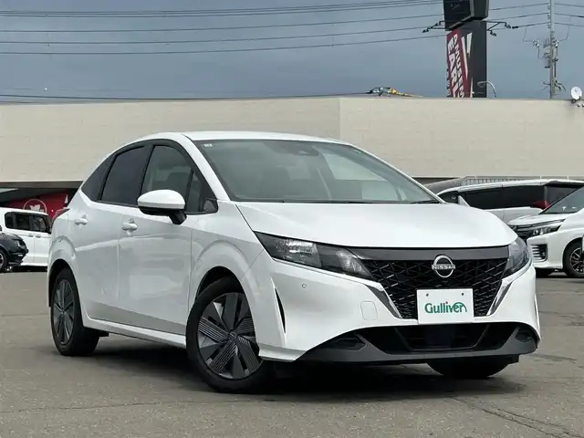 日産 ノート X FOUR 道東・釧路十勝 2022(令4)年 7.8万km ピュアホワイトパール 4WD/純正ナビ/(BT/USB/HDMI/Apple car play/Android)/フルセグテレビ/全方位カメラ/ETC2.0/プッシュスタート/スマートキー/ワイヤレス充電器/全方位運転支援システム/インテリジェントエマージェンシーブレーキ/プロパイロット/追従式クルーズコントロール/革巻きステアリング/ステアリングスイッチ/ステアリングヒーター/前席シートヒーター/前後コーナーセンサー/オートライト/オートマチックハイビーム/保証書/取扱説明書/記録簿