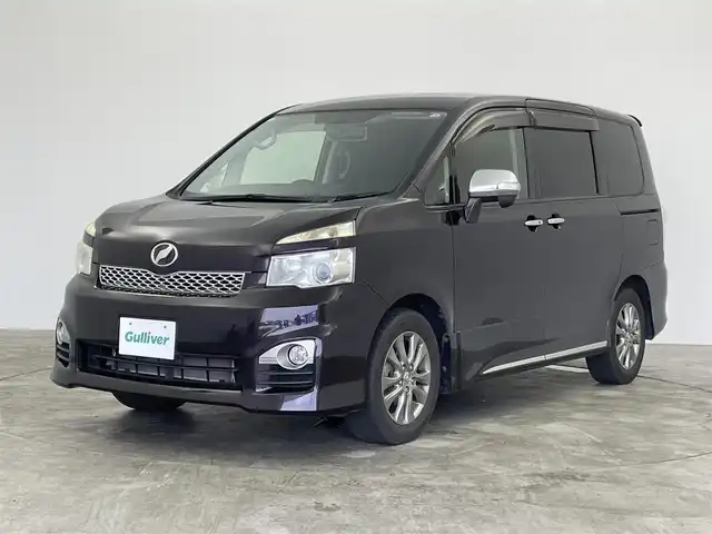 トヨタ ヴォクシー ZS 煌Ⅱ 群馬県 2012(平24)年 7.2万km ボルドーマイカメタリック フリップダウンモニター　ＡＬＰＩＮＥ８インチナビ　バックカメラ　両側パワースライドドア　ＨＩＤオートライト　純正１６インチアルミホイール　パドルシフト　スマートキー　スペアキー　ＥＴＣ　禁煙車