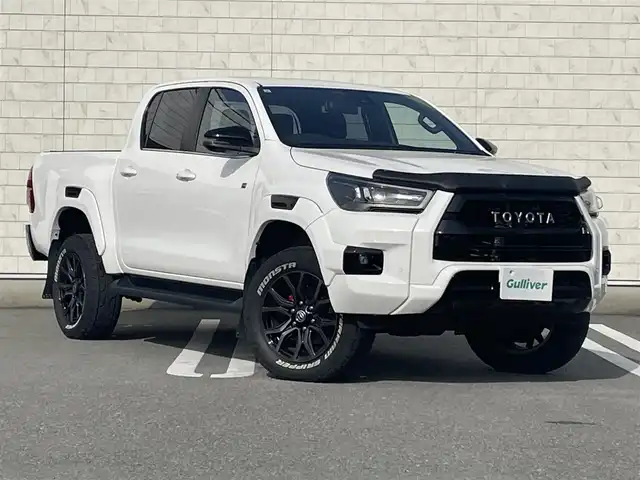 トヨタ ハイラックス Z GRスポーツ 福岡県 2023(令5)年 3.1万km スーパーホワイトⅡ 純正8インチディスプレイオーディオ(AM/FM/BT/Miracast)/全方位カメラ/コーナーセンサー/レーダークルコン/パドルシフト/ETC/前後ドラレコ/DAC/ベッドライナー/サイドステップ/トノカバー/バグガード/GRマッドフラップ/USBポート/純正18インチアルミホイール/スマートキー/プッシュスタート