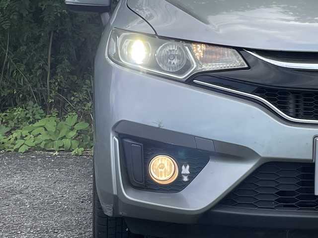 ホンダ フィット 13G Lパッケージ 大分県 2017(平29)年 6.2万km ティンテッドシルバーM 純正SDナビゲーション フルセグTV ブルートゥース/あんしんパッケージ/ナビ装着用スペシャルパッケージ/ハーフレザーシート/LEDヘッドライト/スマートキー/プッシュスタート/純正フロアマット バイザー/アイドリングストップ/オートエアコン/クルーズコントロール