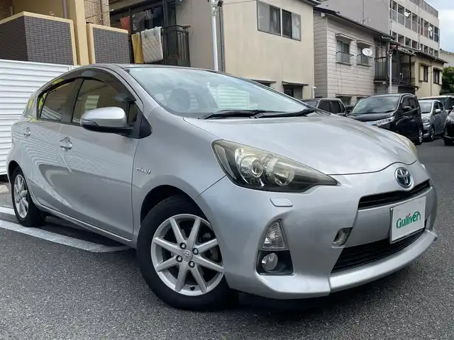 トヨタ アクア G 広島県 2013(平25)年 9.4万km シルバーM /登録時走行距離/　　　　　　　94060キロ/社外ナビ/バックカメラ/地デジ/シートヒーター/スペアキー×１/ETC/新車時整備手帳/　　【保証書】/取扱説明書/