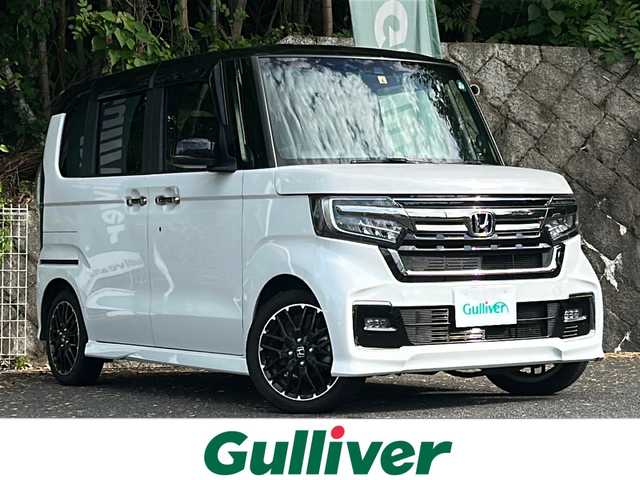 ホンダ Ｎ ＢＯＸ カスタム L ターボ 京都府 2022(令4)年 3.8万km プラチナホワイトパール ワンオーナー/純正ナビ/ ・フルセグTV/BT Audio// ・AM/FM/DVD/CD/バックカメラ/ビルトインETC/レーダークルーズコントロール/ホンダセンシング/・衝突軽減ブレーキ/・誤発進抑制機能/・後方誤発進抑制機能/・歩行者事故低減ステアリング/・路外逸脱抑制機能/・先行車発進お知らせ機能/・標識認識機能/・オートハイビーム/ハンドルアシスト/コーナーセンサー/横滑り防止装置/両側パワースライド/車線逸脱防止/電動パーキングブレーキ/プッシュスタート/電格ウィンカーミラー/ステアリングスイッチ/パドルシフト/ドアバイザー/純正フロアマット/保証書/取扱説明書/スマートスペアキー×1